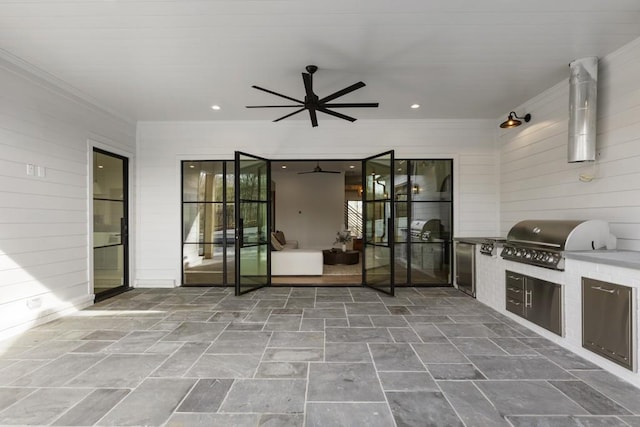 view of patio / terrace with an outdoor kitchen and area for grilling