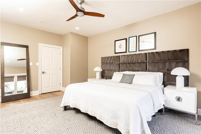 bedroom featuring ceiling fan and light wood-type flooring