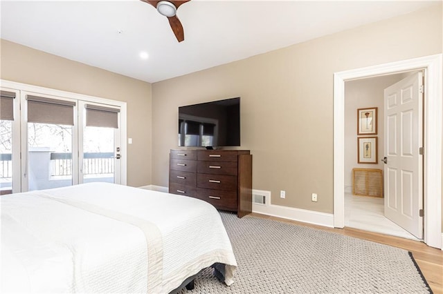 bedroom with ceiling fan, access to outside, and light wood-type flooring