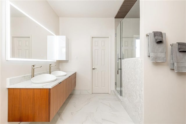 bathroom with vanity and walk in shower