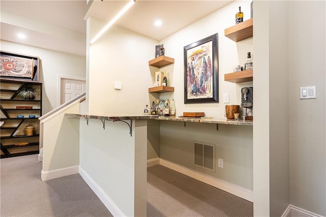 hallway with carpet