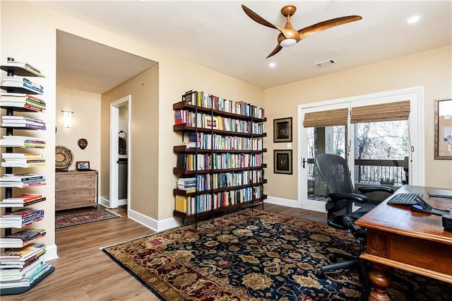 office area featuring hardwood / wood-style flooring and ceiling fan