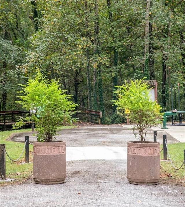 view of property's community featuring a forest view