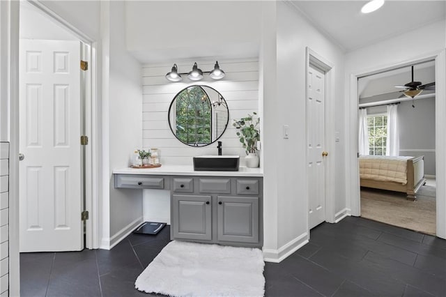 2500 Ashbourne Dr, Lawrenceville, GA 30043 - bathroom with vanity, a ceiling fan, and tile patterned flooring