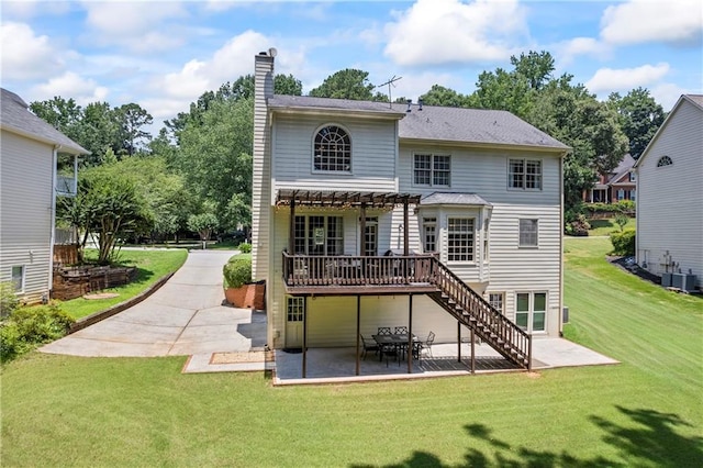 2500 Ashbourne Dr, Lawrenceville, GA 30043 - rear view of property with a pergola, a patio area, a chimney, a yard, and a deck