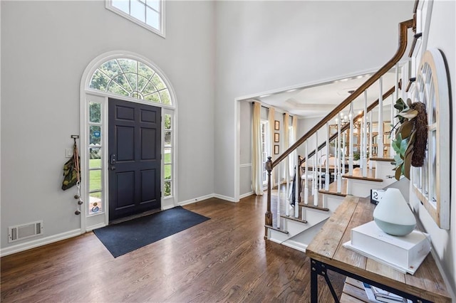 2500 Ashbourne Dr, Lawrenceville, GA 30043 - foyer featuring stairs, wood finished floors, and a towering ceiling
