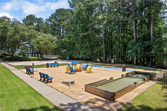 2500 Ashbourne Dr, Lawrenceville, GA 30043 - view of home's community with a game area and view of scattered trees
