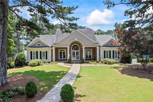 2500 Ashbourne Dr, Lawrenceville, GA 30043 - neoclassical home featuring french doors and a front lawn