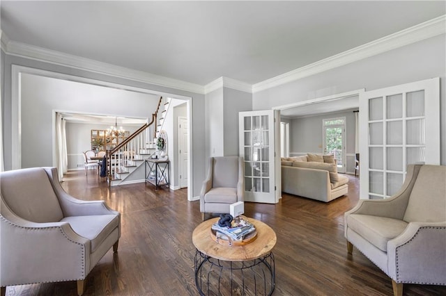 2500 Ashbourne Dr, Lawrenceville, GA 30043 - living area featuring a chandelier, crown molding, wood finished floors, and stairway