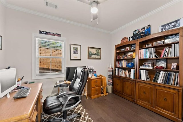 home office featuring a ceiling fan, ornamental molding, dark wood-style floors, and visible vents
