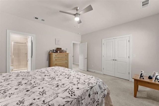 bedroom with ceiling fan, light carpet, a closet, and visible vents