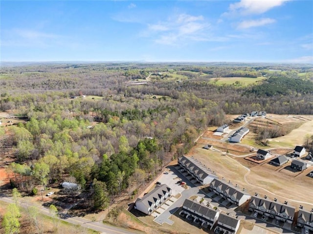 aerial view featuring a view of trees