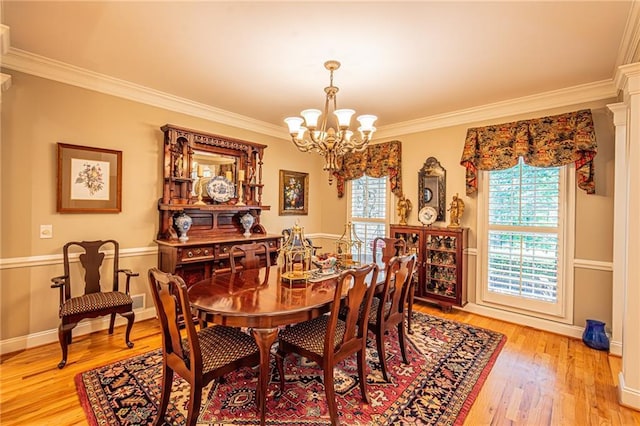6369 Timber Creek Trl, Dahlonega, GA 30533 - dining area featuring ornamental molding, a chandelier, and light wood-style flooring