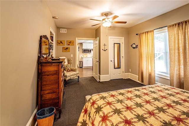 6369 Timber Creek Trl, Dahlonega, GA 30533 - bedroom with dark carpet and ceiling fan