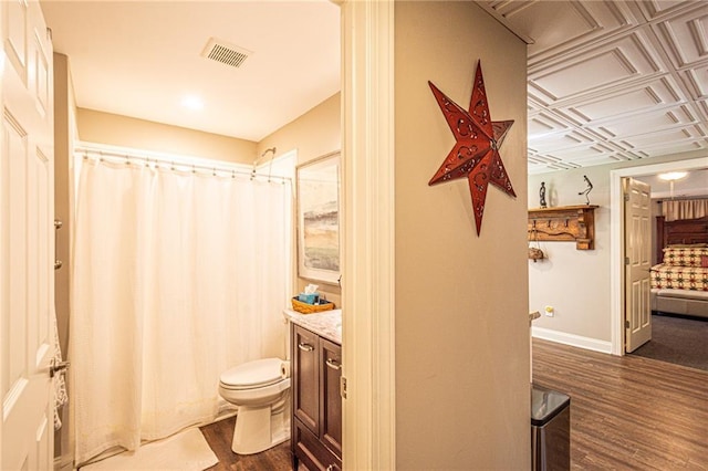 6369 Timber Creek Trl, Dahlonega, GA 30533 - bathroom with wood finished floors, vanity, and curtained shower