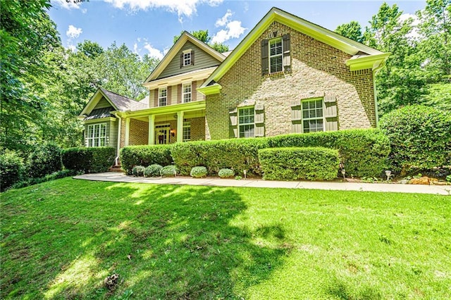 6369 Timber Creek Trl, Dahlonega, GA 30533 - view of front of house with a front yard and brick siding