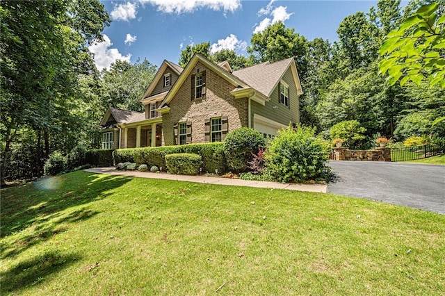 6369 Timber Creek Trl, Dahlonega, GA 30533 - view of front of house with brick siding, driveway, and an attached garage