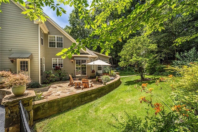 6369 Timber Creek Trl, Dahlonega, GA 30533 - view of green lawn with a patio area
