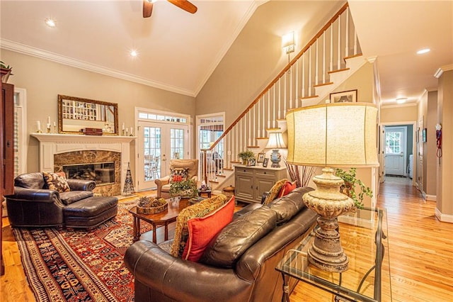 6369 Timber Creek Trl, Dahlonega, GA 30533 - living room featuring stairs, wood finished floors, crown molding, ceiling fan, and a fireplace