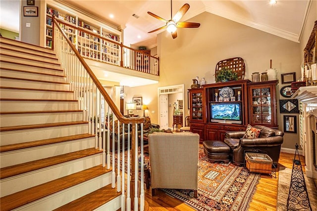 6369 Timber Creek Trl, Dahlonega, GA 30533 - living area with a ceiling fan, stairway, wood finished floors, crown molding, and a fireplace