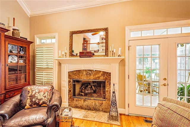 6369 Timber Creek Trl, Dahlonega, GA 30533 - sitting room with crown molding, wood finished floors, and a high end fireplace
