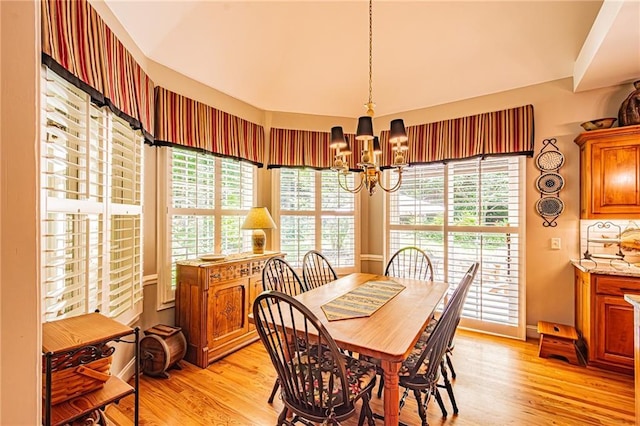 6369 Timber Creek Trl, Dahlonega, GA 30533 - dining room featuring a chandelier and light wood-type flooring