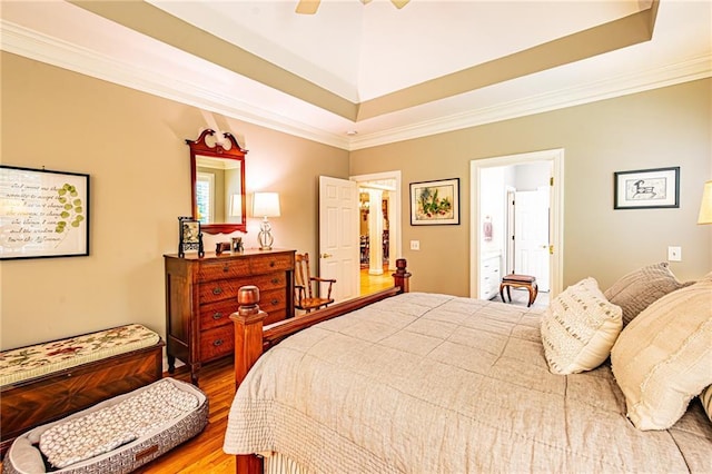 6369 Timber Creek Trl, Dahlonega, GA 30533 - bedroom featuring wood finished floors, ornamental molding, a ceiling fan, and a raised ceiling