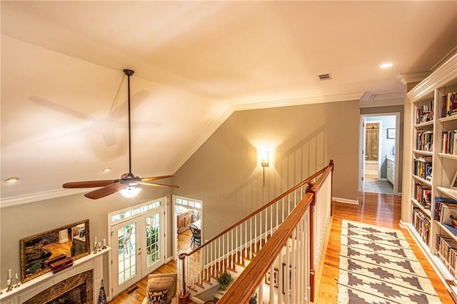 6369 Timber Creek Trl, Dahlonega, GA 30533 - hallway featuring crown molding, an upstairs landing, light wood finished floors, french doors, and recessed lighting