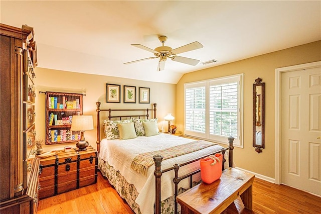 6369 Timber Creek Trl, Dahlonega, GA 30533 - bedroom with vaulted ceiling, light wood-type flooring, and ceiling fan