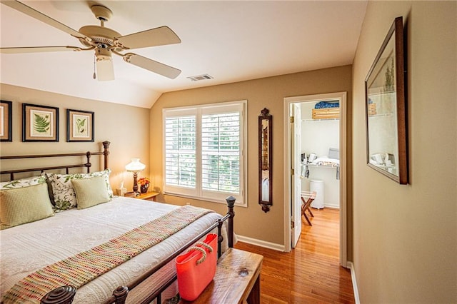 6369 Timber Creek Trl, Dahlonega, GA 30533 - bedroom with light wood-style flooring, lofted ceiling, and ceiling fan
