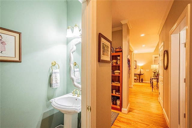 6369 Timber Creek Trl, Dahlonega, GA 30533 - half bath featuring crown molding and wood finished floors