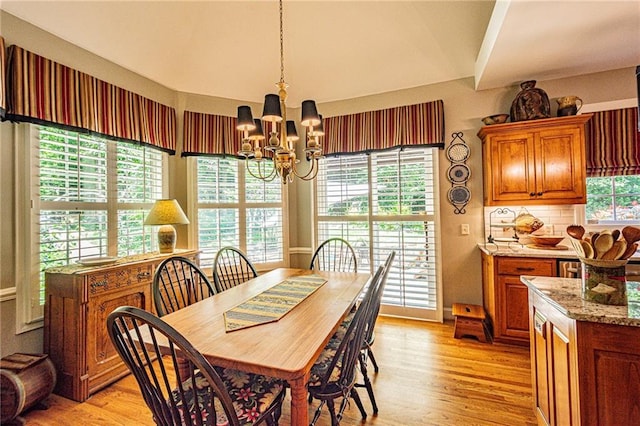 6369 Timber Creek Trl, Dahlonega, GA 30533 - dining space featuring a chandelier and light wood-style floors