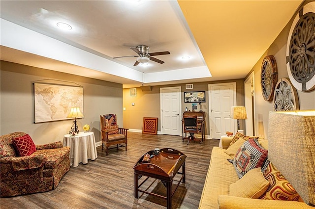 6369 Timber Creek Trl, Dahlonega, GA 30533 - living area featuring ceiling fan, wood finished floors, and a tray ceiling