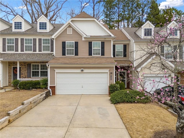 view of front of property with an attached garage, brick siding, driveway, and roof with shingles