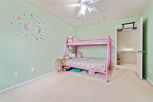 bedroom with baseboards, carpet floors, and ceiling fan