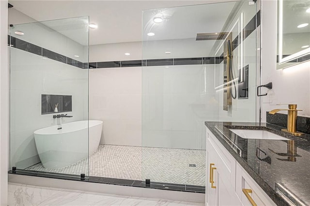 2432 Thompson Mill Rd, Gainesville, GA 30506 - full bath with tiled shower, a freestanding tub, vanity, recessed lighting, and marble finish flooring