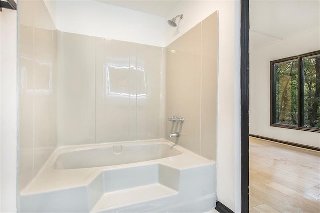 2432 Thompson Mill Rd, Gainesville, GA 30506 - full bathroom featuring  shower combination and hardwood / wood-style flooring