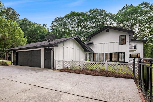 2432 Thompson Mill Rd, Gainesville, GA 30506 - view of front of property featuring a detached garage and board and batten siding