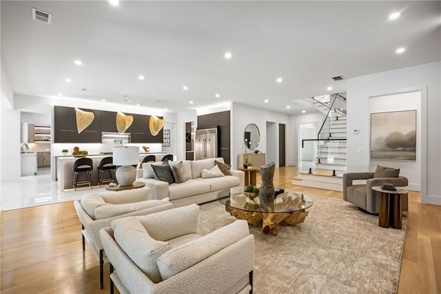 942 Fairfield, Marietta, GA 30068 - living room with stairs, light wood-style flooring, and recessed lighting