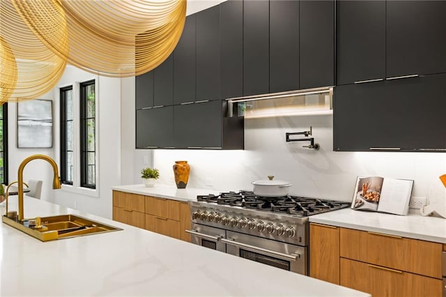942 Fairfield, Marietta, GA 30068 - kitchen with double oven range, a sink, dark cabinetry, and modern cabinets