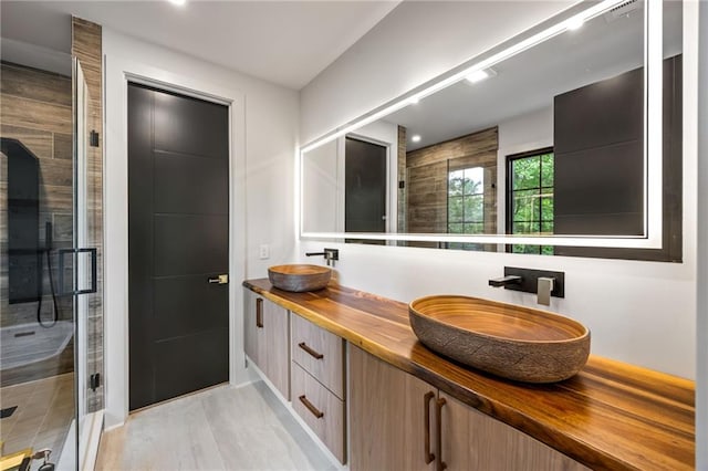 942 Fairfield, Marietta, GA 30068 - full bath featuring a stall shower, double vanity, and baseboards