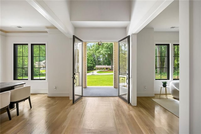 942 Fairfield, Marietta, GA 30068 - foyer entrance featuring baseboards, wood finished floors, and healthy amount of natural light