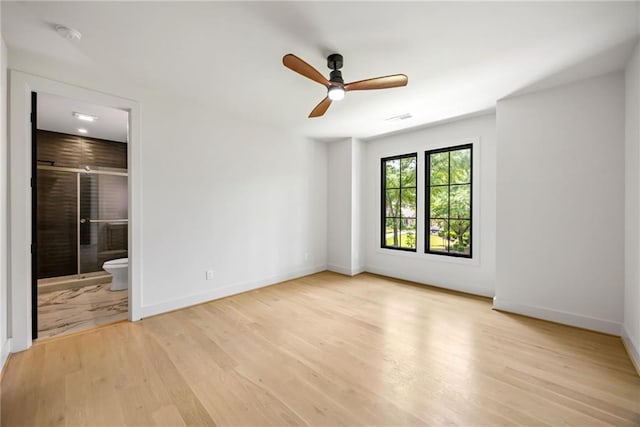 942 Fairfield, Marietta, GA 30068 - spare room with wood finished floors, ceiling fan, and baseboards
