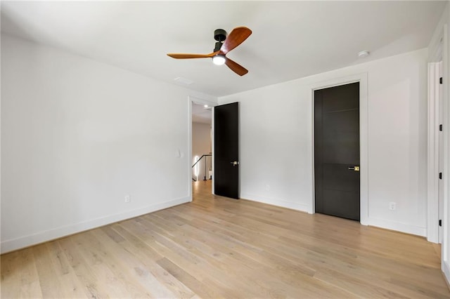 942 Fairfield, Marietta, GA 30068 - unfurnished bedroom featuring light wood finished floors, baseboards, and a ceiling fan