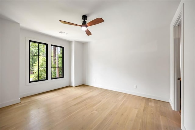 942 Fairfield, Marietta, GA 30068 - unfurnished room with light wood-style flooring, baseboards, and a ceiling fan