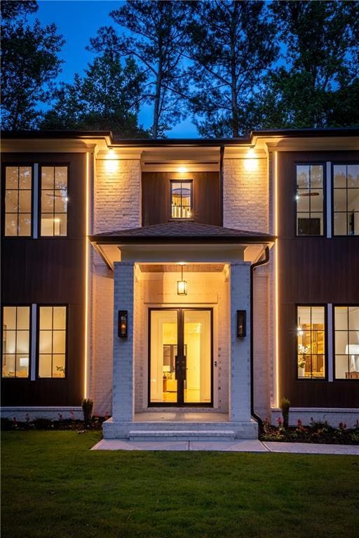 942 Fairfield, Marietta, GA 30068 - doorway to property with brick siding and a yard