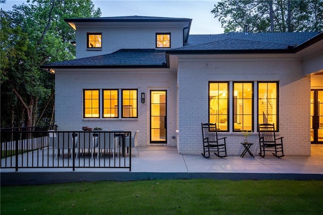 942 Fairfield, Marietta, GA 30068 - rear view of house with brick siding, a shingled roof, and a patio