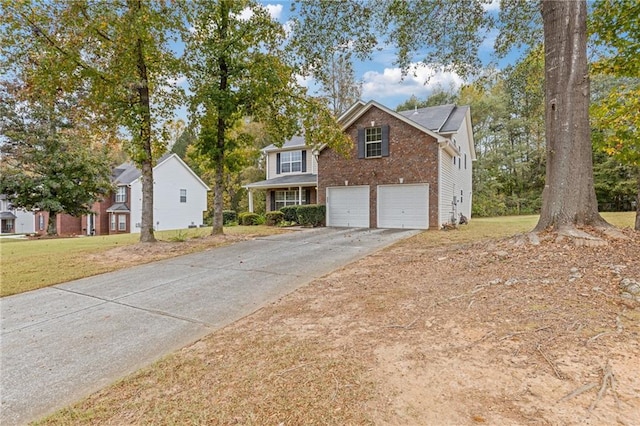 front facade featuring a garage and a front yard