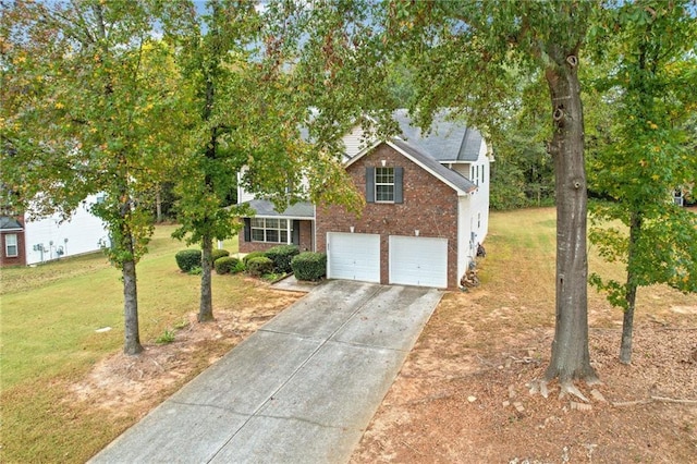 view of front facade featuring a garage and a front lawn