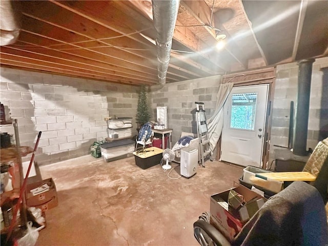 basement featuring concrete block wall